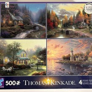 Like New Set of 4 Thomas Kinkade Jigsaw Puzzles